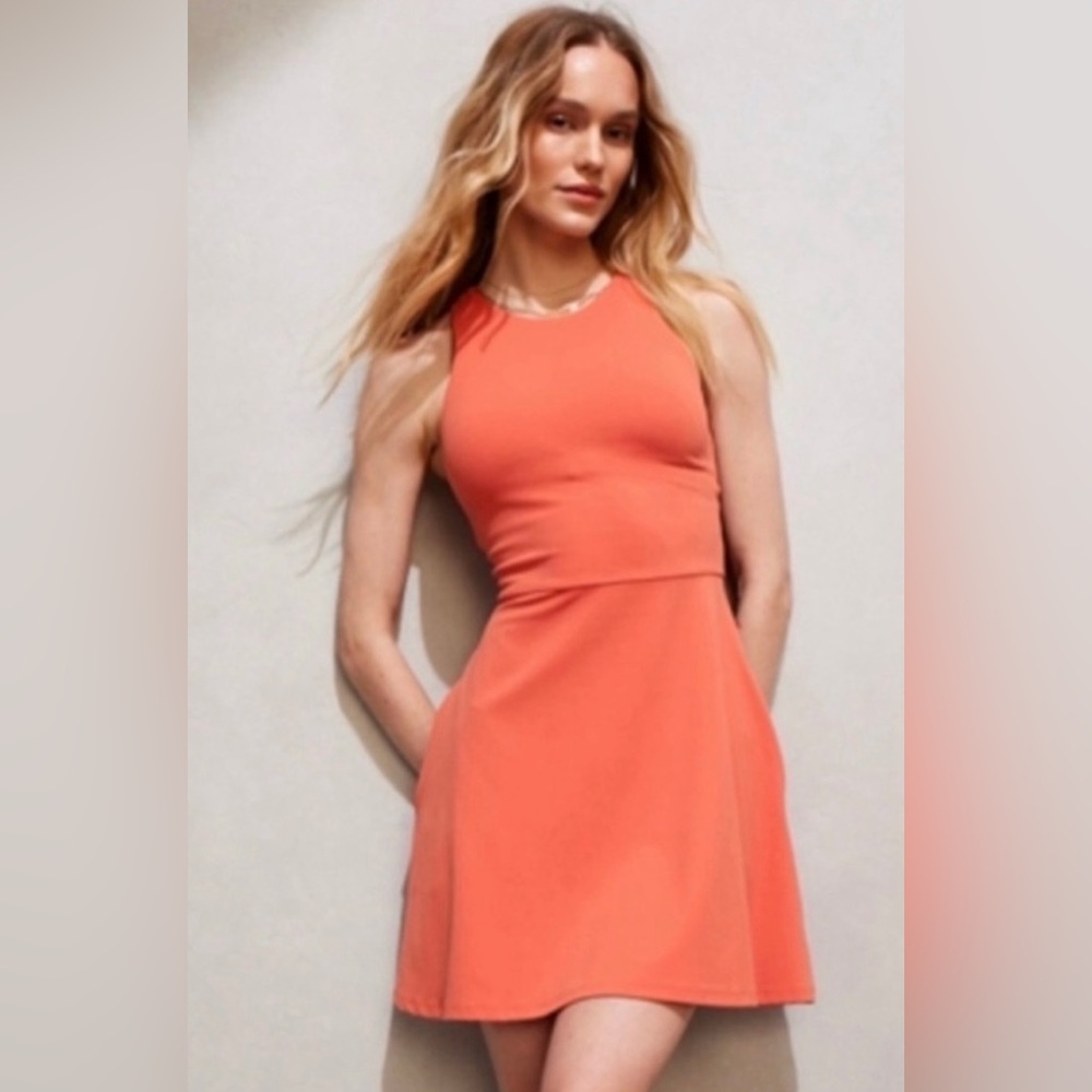 Athleta coral /orange Conscious Dress
With side pockets